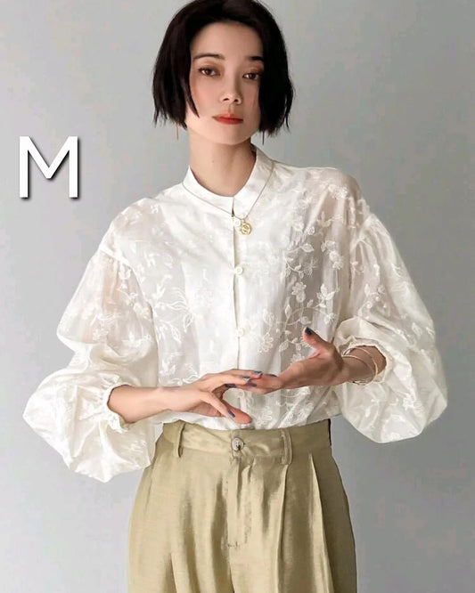 Top, M